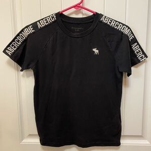 Abercrombie kids black tshirt. Size Youth 11-12. Logo on sleeves.
